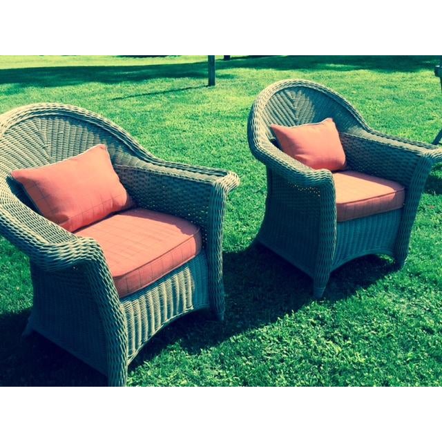 Wicker Armchairs With Orange Cushions Pair Chairish